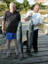 cruise ship passengers with their wahoo at GYC dock