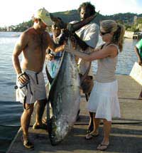 Jamie with her Tuna at fishmarket dock