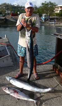 Ziggy with the 2 wahoo and king mackerel