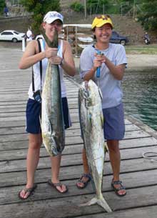 student girls with their great dorado catch