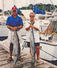 Beppe & Silvie hold wahoo they caught at GYC dock
