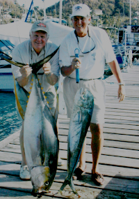 Clients with yellowfin tuna and dorado
