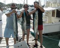cruise ship passengers with the wahoo caught this afternoon