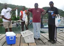 Grenadians with their small fish catch