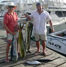 Gary & Clifford hold their dorado caught by True Blue Sportfishing